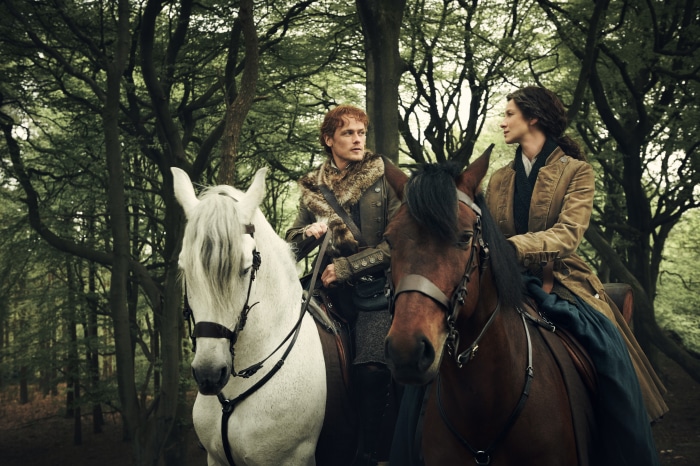 Jamie Fraser and Claire Fraser from Outlander on horseback