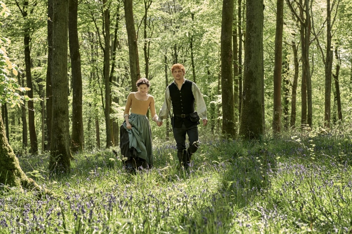 Jamie and Claire Fraser from Outlander in a forest