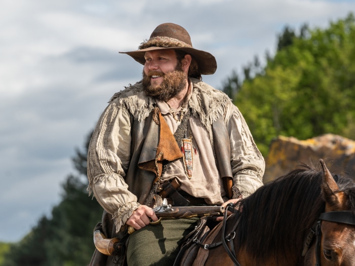 Man in historical costume on horseback