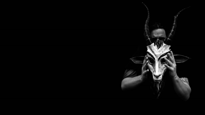 Person wearing a goat mask