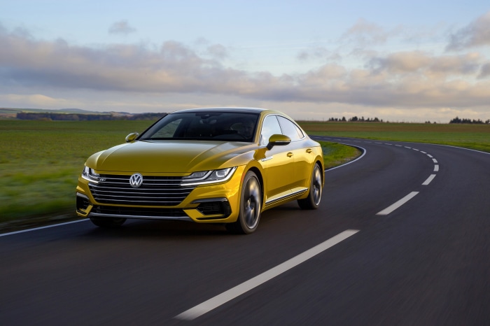 Yellow Volkswagen Arteon R-Line 4K on a Road