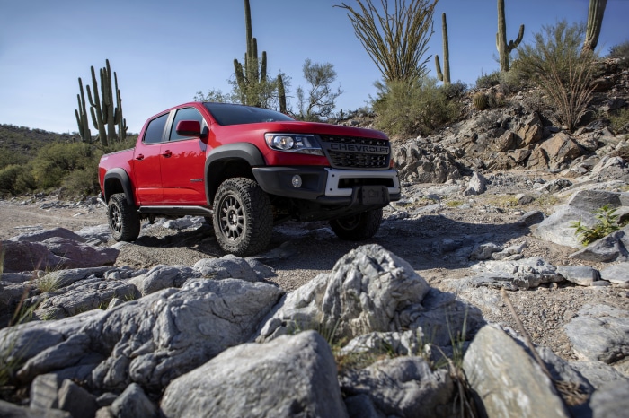 Red Chevrolet Colorado ZR2 in desert landscape