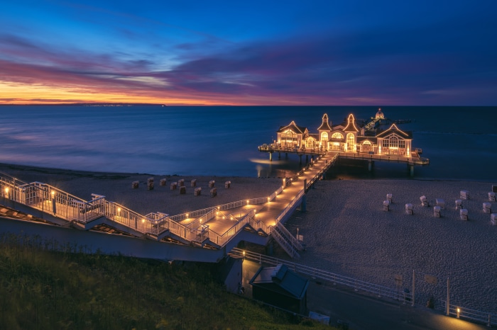 Pier with building at dusk, Sellin, Germany 4K