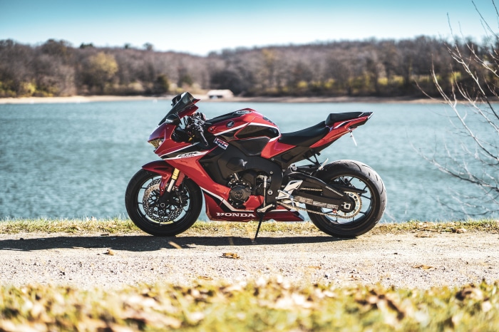 Red Honda CBR1000RR Motorcycle by Lake