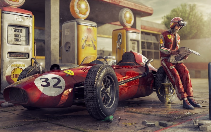 Vintage Ferrari F1 car at a Shell gas station