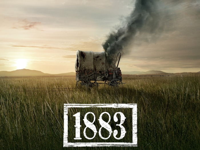 1883 Wagon on Fire in Field