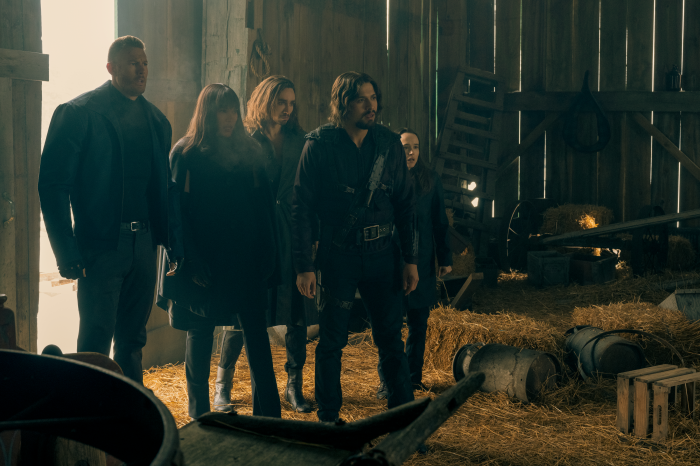 The Umbrella Academy characters in a barn