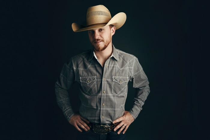 Cody Johnson wearing a cowboy hat and shirt