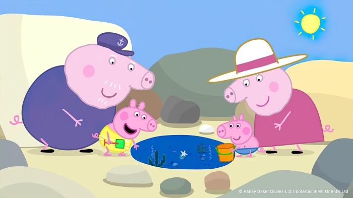 Peppa Pig characters at the beach