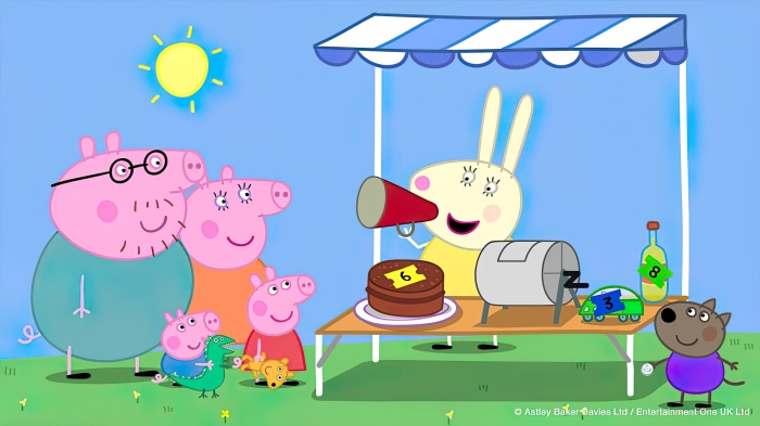 Peppa Pig characters at a fair stall