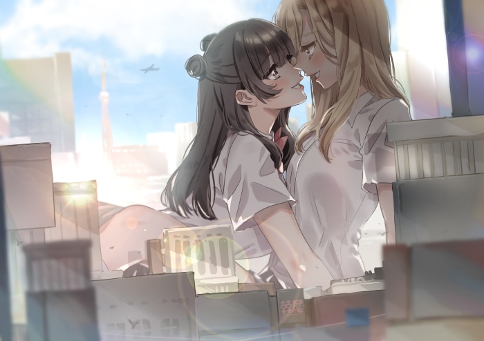 Two girls in white shirts in front of city buildings