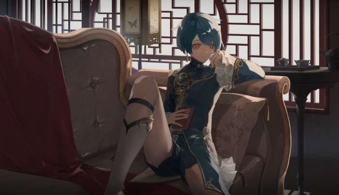 Xingqiu from Genshin Impact sitting on a couch