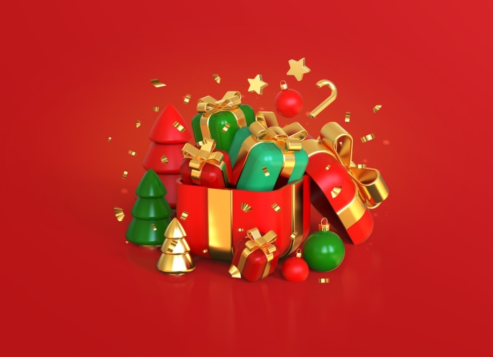 Christmas gifts and decorations on red background