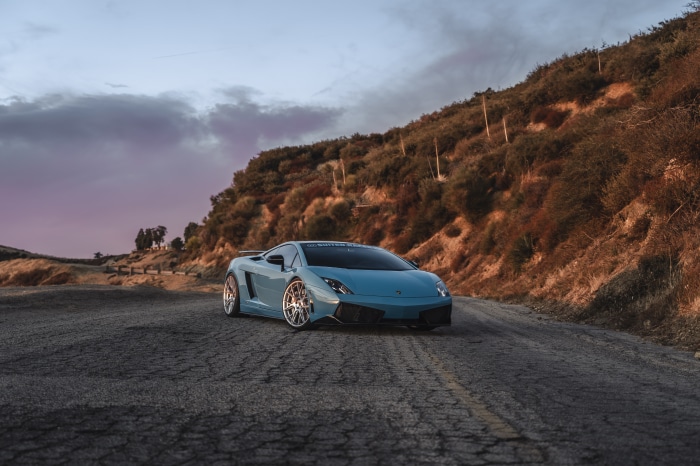 Blue Lamborghini Gallardo on a Mountain Road