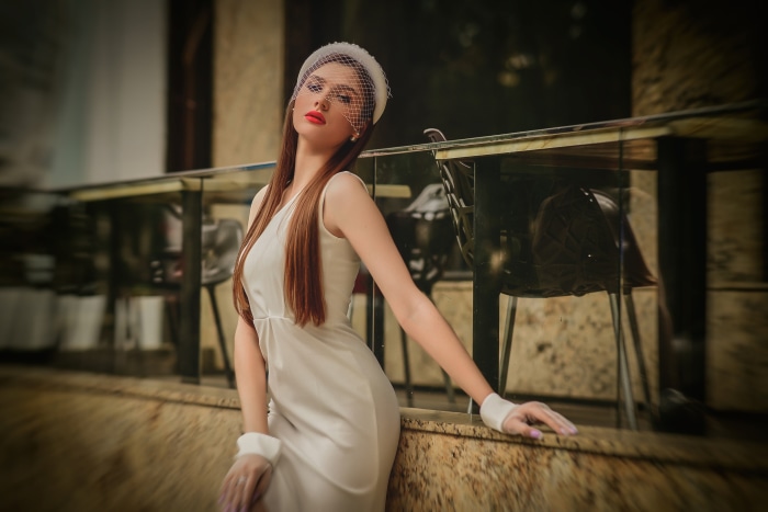 Anastasia Donskaya in a white dress