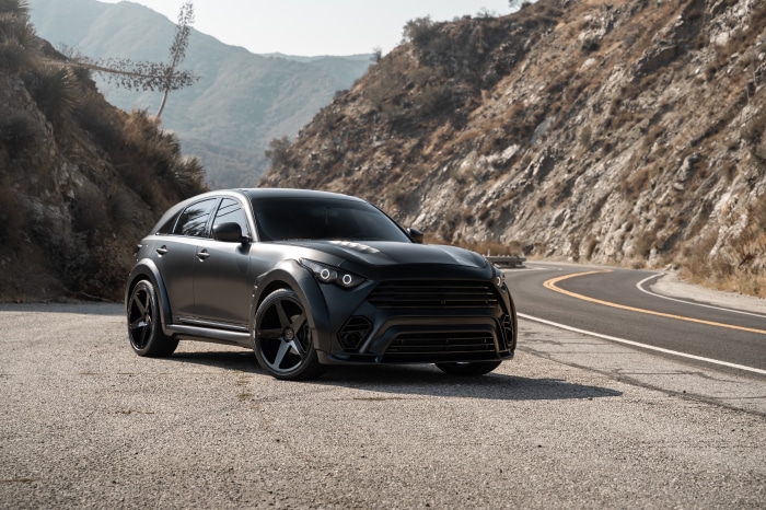 Matte Black Infiniti QX70 SUV on Mountain Road