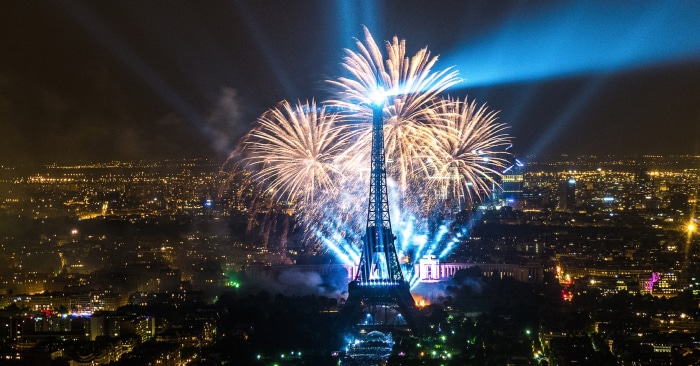 Eiffel Tower fireworks display over Paris at night