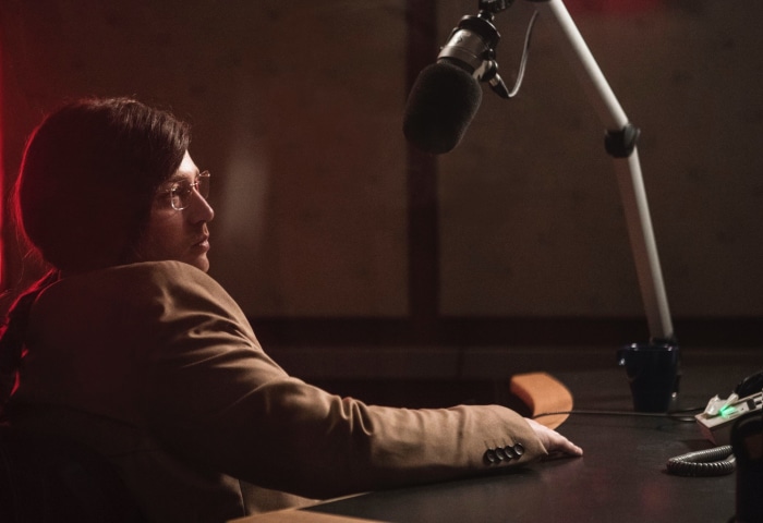 Emory Cohen in a recording studio