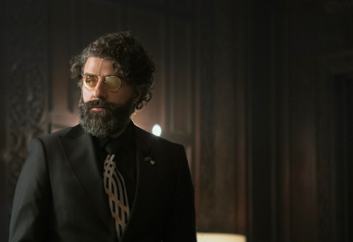Oscar Isaac in a suit