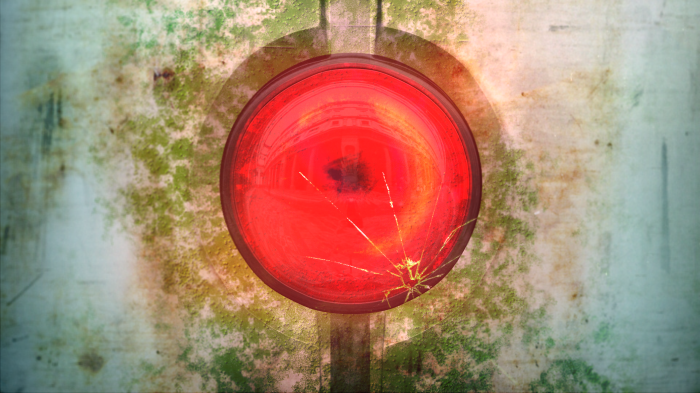 Red portal with cracks on a weathered surface