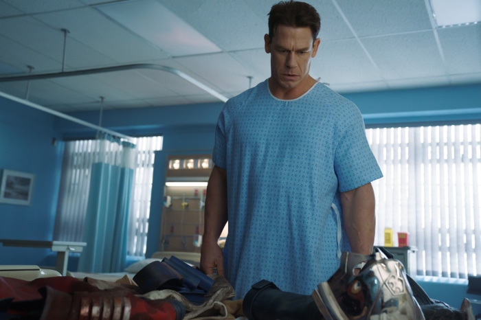 John Cena as Peacemaker in a hospital gown