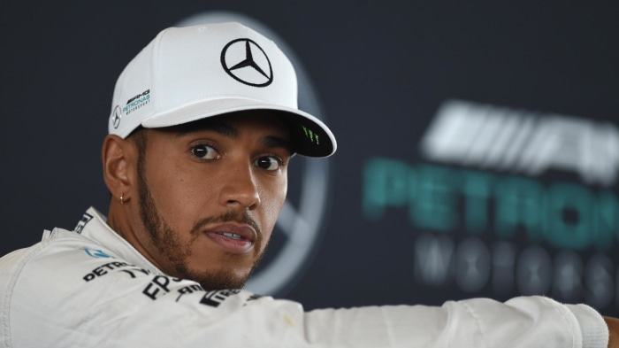 Lewis Hamilton wearing a Mercedes-AMG Petronas Formula One Team cap