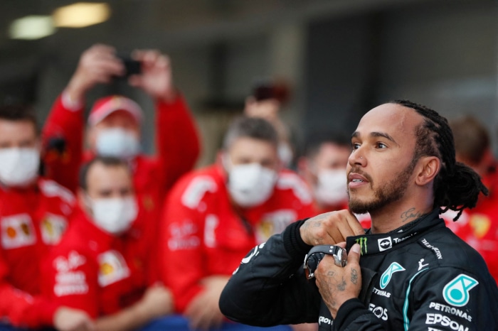 Lewis Hamilton in a Mercedes-AMG Petronas Formula One Team racing suit