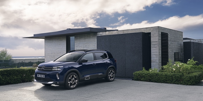 Citroen C5 Aircross SUV parked by a modern house
