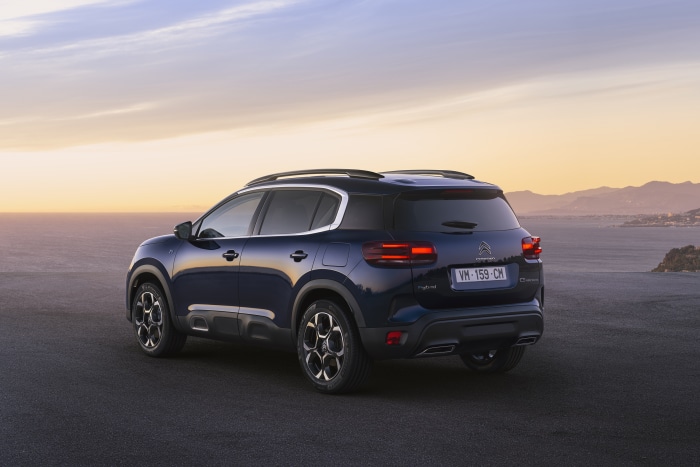 Citroen C5 Aircross SUV parked by the sea at sunset