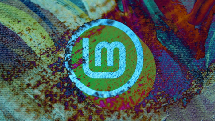 Linux Mint logo on abstract background
