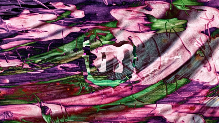 Linux Mint logo on abstract background
