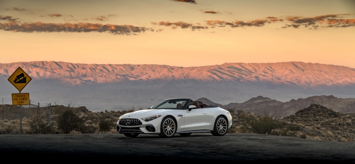 White Mercedes-AMG SL 55 4MATIC Cabriolet on Mountain Road