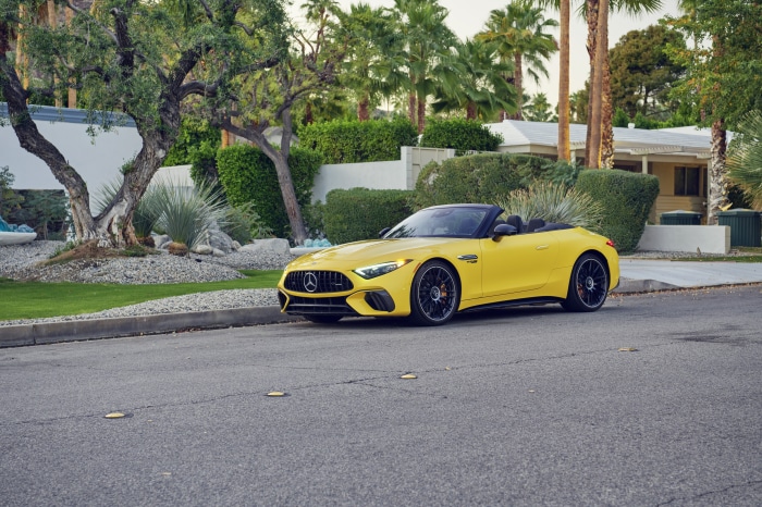 Yellow Mercedes-AMG SL Cabriolet parked on street