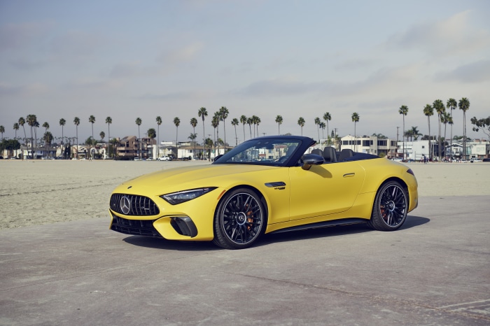Yellow Mercedes-AMG SL 63 4MATIC Cabriolet on beach