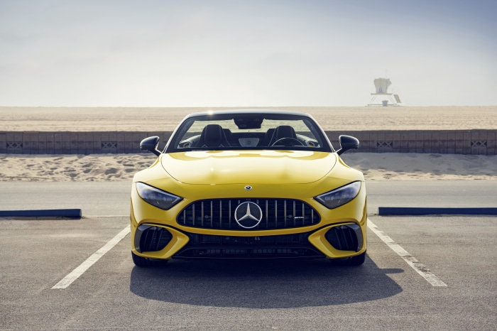 Yellow Mercedes-AMG SL Cabriolet parked at beach