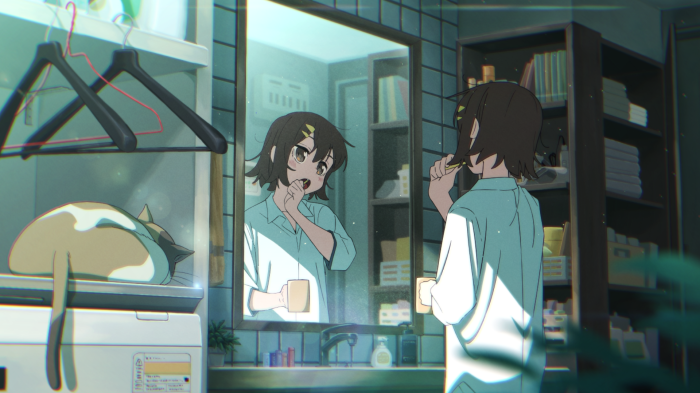Girl brushing teeth in front of mirror with cat