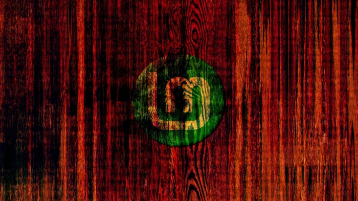 Linux Mint logo on wood texture