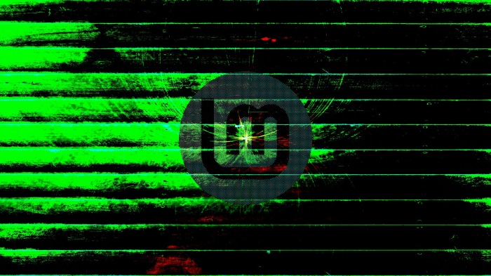 Linux Mint logo on a green and black striped background