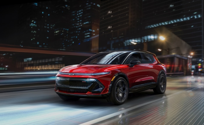 2024 Chevrolet Equinox EV driving at night