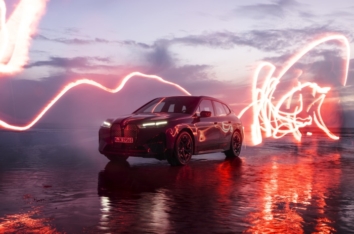 BMW iX M60 electric SUV with light trails
