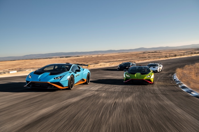 Lamborghini Huracán STO cars on a racetrack