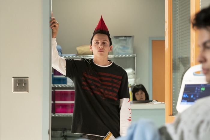 Hawk from Cobra Kai in a hospital room