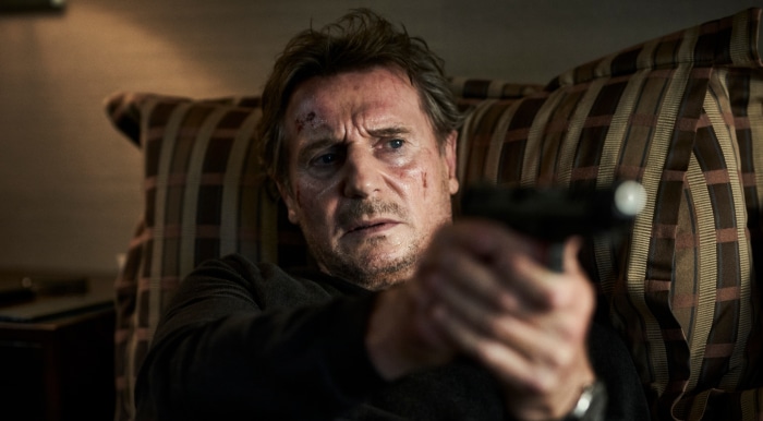 Liam Neeson with gun in Blacklight 4K