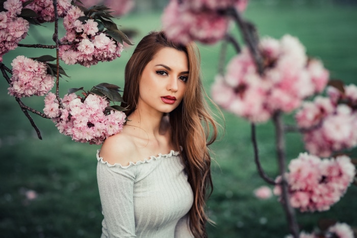 Woman with pink blossoms