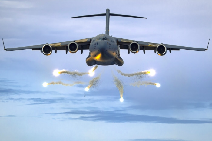 Boeing C-17 Globemaster III deploying flares