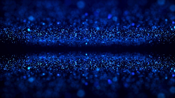 Abstract Blue Glitter Particles