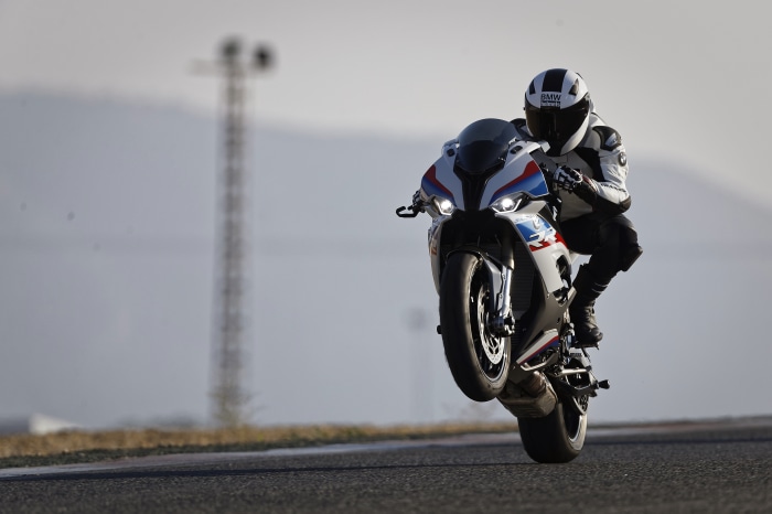 BMW S1000RR motorcycle stunt on a track