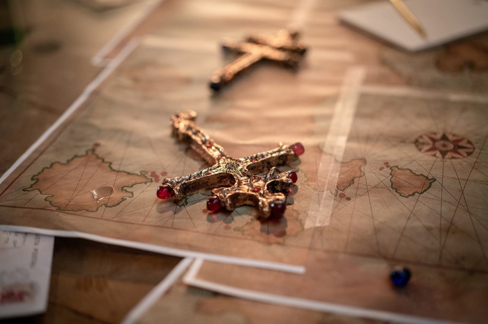 Two inverted crosses on a map