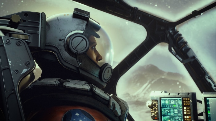 Astronaut in a spaceship cockpit looking out at a planet