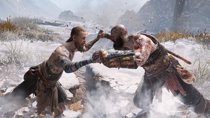 Kratos and Baldur fighting in God of War